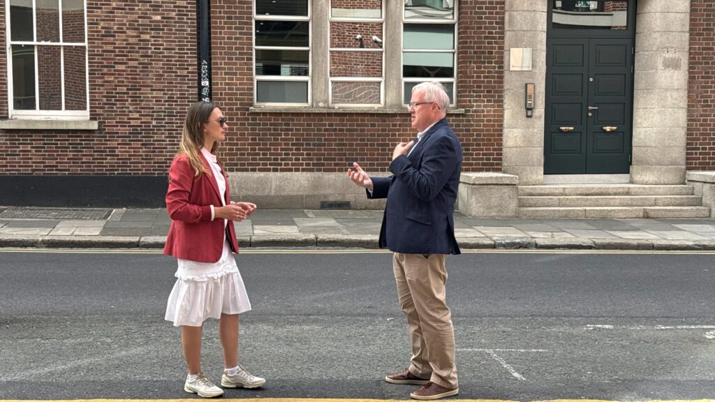 Guide explaining Dublin architecture to a guest on a small-group walking tou